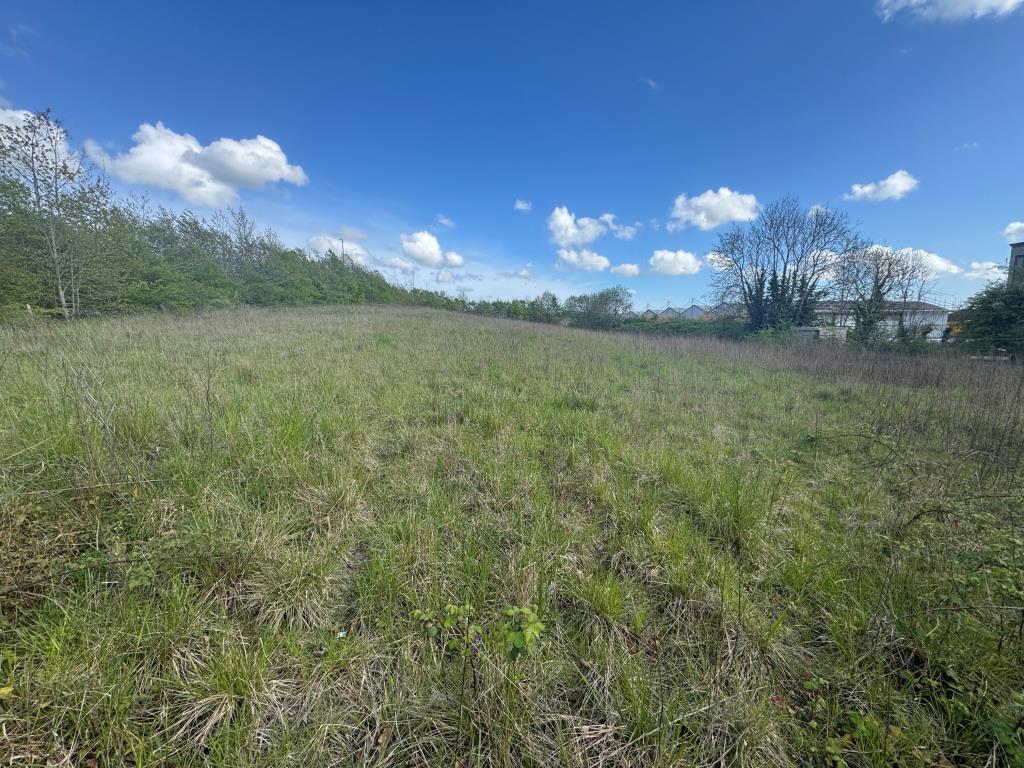 Lot: 54 - SITE WITH LAPSED PLANNING FOR 120-SPACE CAR PARK - General view of the land 2